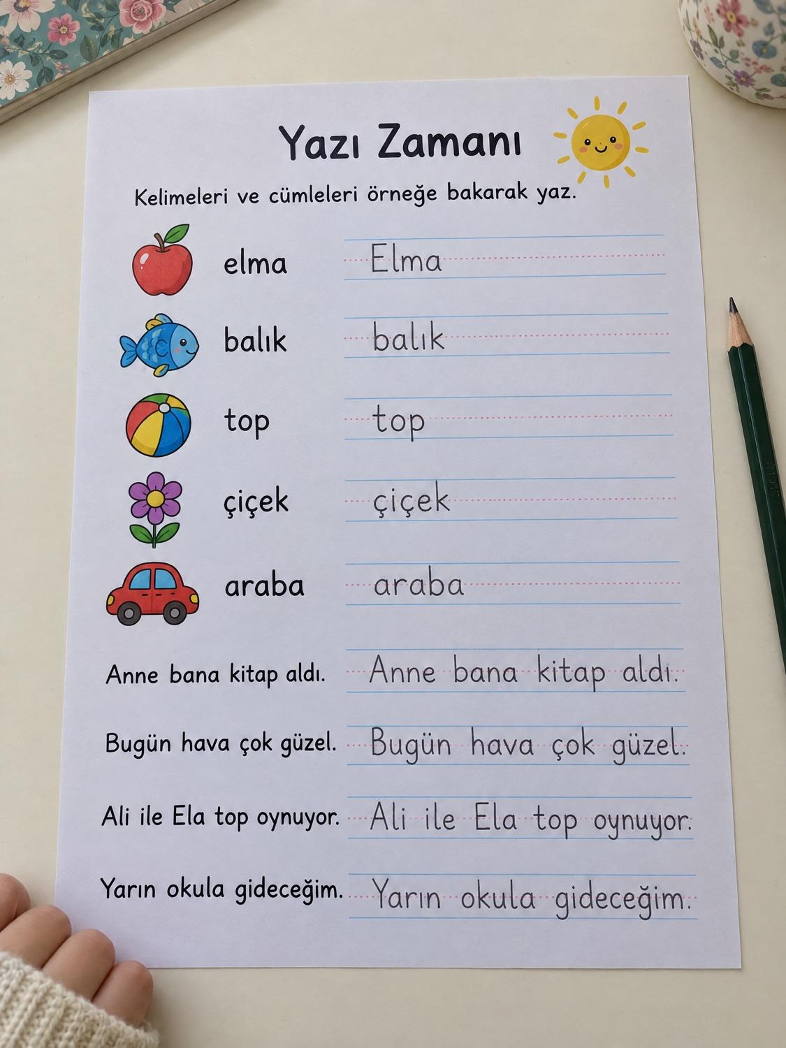 Çalışma kâğıdında kurşun kalemle düzgün ve düzenli yazılmış kelimeler ve cümleler (örnek görsel)