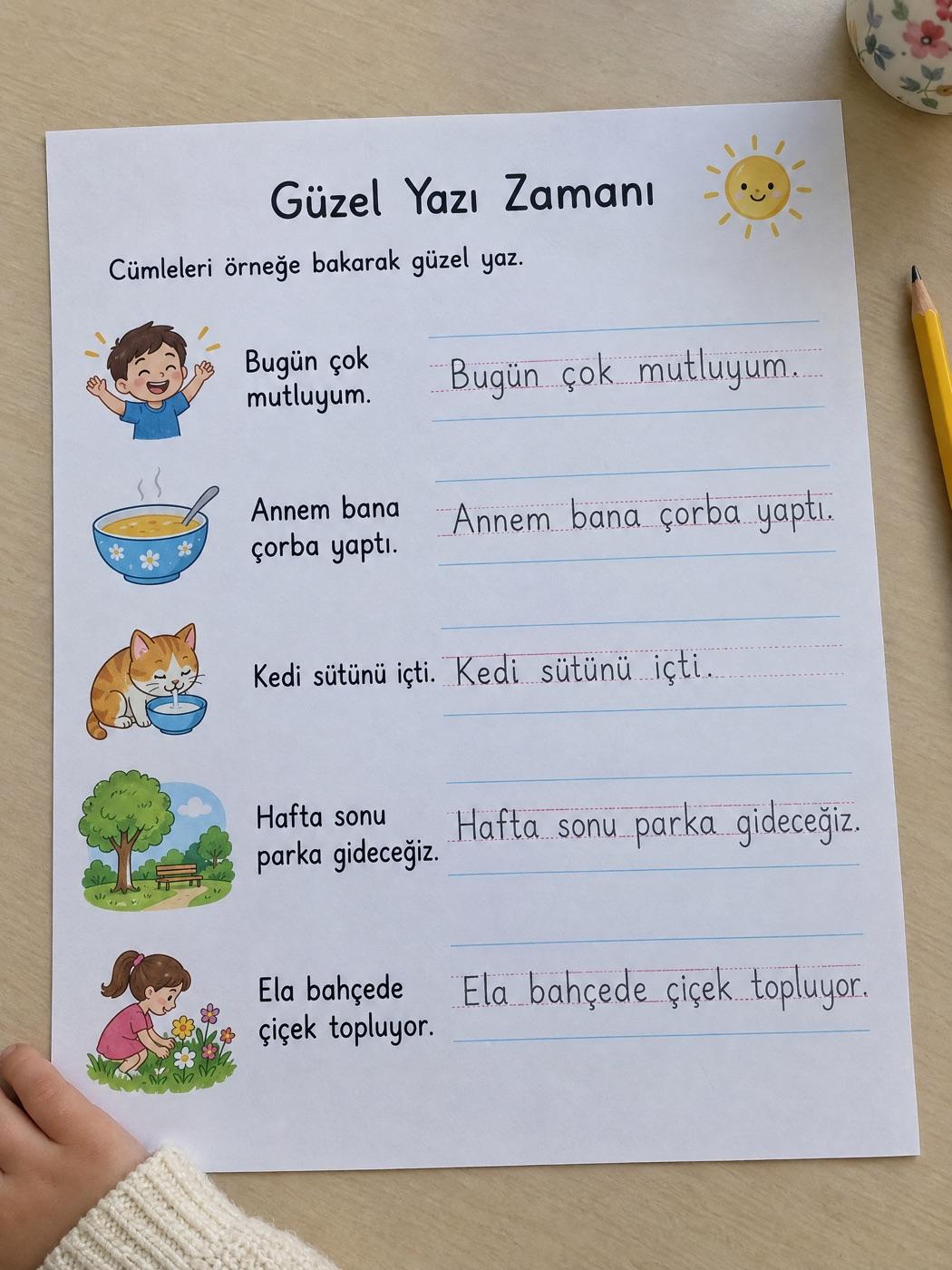 Çalışma kâğıdında kurşun kalemle düzgün ve düzenli yazılmış kelimeler ve cümleler (örnek görsel)